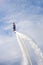 Russia. Vyborg. 05.09.2020. A man flies on a FlyBoard. vertical frame