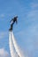 Russia. Vyborg. 05.09.2020. A man flies on a FlyBoard. vertical frame