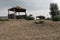 Russia, wooden gazebos of the chalet for rest empty on the shore of the lake on the beach