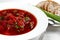 Russian beet and cabbage soup in a white bowl