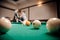 Russian billiards, man plays and beats cue on white ball