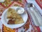 Russian blini pancakes with sour cream in a plate. Russian cuisine