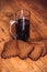 Russian brew in mug and loaf of rye flour on wooden background