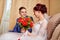 Russian bride and groom in the room at home in ordinary interior of Russia