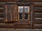 Russian Brown Log Cabin with Wooden Shutters