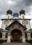 Russian Christian church, a temple on a background of gray sky and clouds