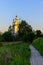 Russian Church of the Trinity against the blue sky, Totma, Russia. Sunset on the banks of the Sukhona river in the city of Totma