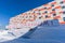 Russian city of Barentsburg on the Spitsbergen archipelago in the winter in the Arctic In sunny weather and blue sky