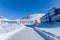 Russian city of Barentsburg on the Spitsbergen archipelago in the winter in the Arctic In sunny weather and blue sky