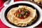Russian cuisine. Meat dumplings stuffed with vegetables and sour cream. Pancakes with minced meat and vegetables. Generative AI
