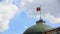 Russian flag flying over Kremlin dome