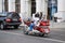 Russian football fan on a motorcycle `Honda Gold Wing` with the toy Zabivaka on the back rides on Varvarka street in the days of t