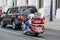 Russian football fan on a motorcycle `Honda Gold Wing` with the toy Zabivaka on the back rides on Varvarka street in the days of t