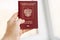 Russian foreign international passport in the hand citizen. Russian citizenship, passport and rights concept