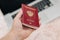 Russian foreign international passport in the hand citizen. Russian citizenship, passport and rights concept