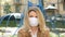 Russian girl blonde portrait in a medical mask protection against viral diseases