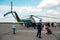 Russian green military helicopter on the observation deck at the Aviation Day