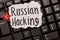 Russian hacking, inscription on torn paper sheet.