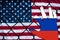 Russian hand peering at american flag