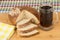 Russian kvas in mug, napkin and slices of bread