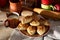 Russian meat piroshki. Traditional hand mini pies on wooden background