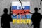 Russian military aggression. Flag of Russia painted on concrete wall with word STOP WAR