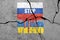 Russian military aggression. Flag of Russia painted on concrete wall with word STOP WAR