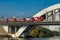 Russian modern high-speed electric train on a bridge. Sunny day