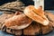 Russian national bread Kalach on a wooden background. National bread products