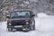 Russian off-road car Lada Niva on a snowy road