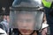 Russian OMON Police special force officer at protest rally in Saint Petersburg, misted helmet glass