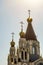 Russian Orthodox Church towers with three domes and crosses