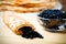 Russian pancakes - blini with black caviar. Shallow depth of fie