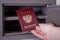 Russian passport in the safe with rubles