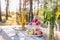 Russian samovar with cups on a table with apples and field flowers bouquet