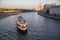 Russian scene: River trips on the Moscow river, view for the Vodootvodny canal in Moscow near Bolotnaya square at dusk