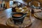 Russian soup, borsch, in a cast iron pot on the background of rye bread