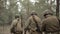 Russian Soviet Infantry Red Army Soldiers Of World War II Marching Walking Along Forest Road In Summer Day. Group of