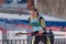 Russian sportsman biathlete Khanzutin Artem skiing on ski track distance biathlon stadium. Junior biathlon competitions East of