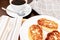 Russian syrniki or sirniki, homemade cottage cheese fritters or pancakes. breakfast with curd pankakes and a cup of coffee