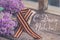 Russian text - Victory Day, Saint George ribbon with lilac branch, symbol of Victory Day, May 9