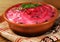 Russian traditional beetroot salad with fish herring