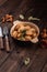 Russian traditional meal homemade dumplings stuffed with chanterelle mushrooms in a bowl on a dark wooden background, national