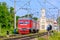 Russian train in the summer. The train is coming to the station. railway. Russia, Leningrad region, Peterhof, June 20