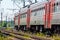 Russian train in the summer. The train is coming to the station. railway. Russia, Leningrad region, Peterhof, June 20