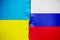 Russian and Ukrainian flags War between Ukraine and Russia