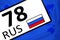 Russian Vehicle registration license plate, registration mark with 77 automobile code of regions of Russia Moscow and flag of