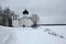 Russian winter. Church of Saint Elijah the Prophet at the Vybuty Pogost near Pskov, Russia