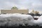 Russian winter. Huge snowhill. Moscow Kremlin at background. Color photo.
