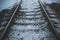 Russian winter railway rusty abandoned covered with mud snow